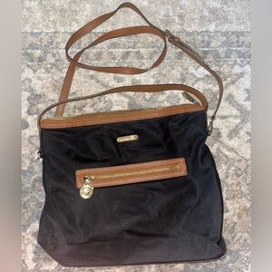 Michael Kors black crossbody bag with camel accents